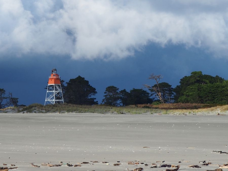 lighthouse dark clouds