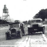 historic trucks at lighthouse